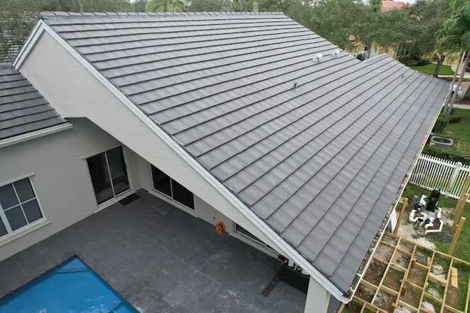 Discover how metal roofs, new roof replacement, and impact windows and doors replacements protect Florida homes