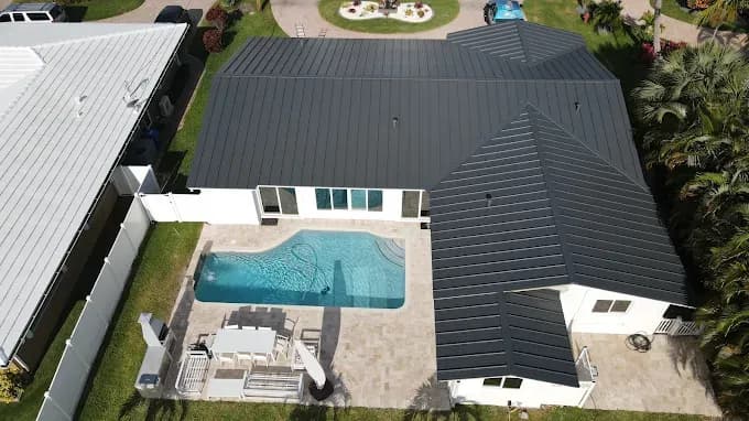 Combine smart home technology with metal roofs, new roof replacement, and impact windows